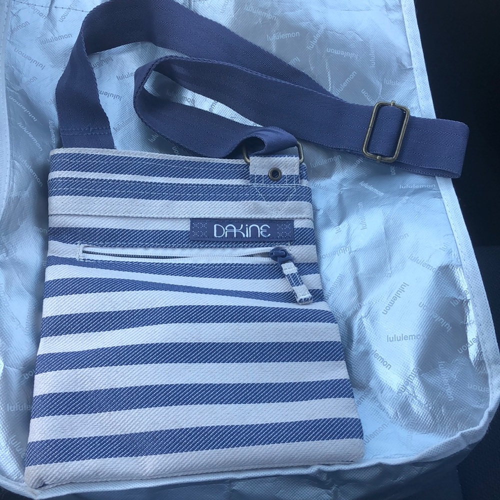 Dakine crossbody bag. Never used, blue/gray and white stripe.